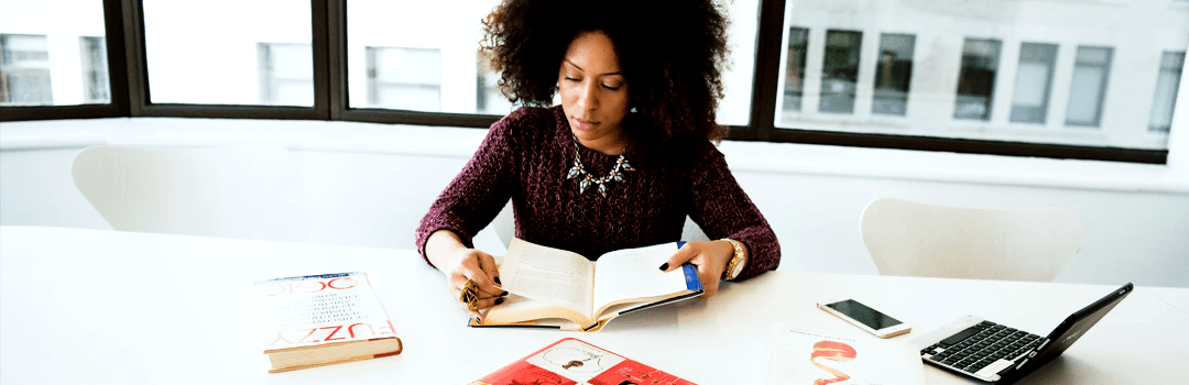 girl reading a book image